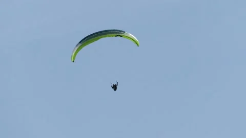 Paraglider rotating in the sky in Cilento Video stock 255799672