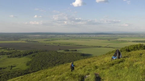 Paraglider on the side of a mountain. Stock Footage 95999088