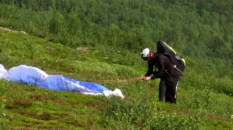 Paraglider slings corrected before flight. Stock Footage 68725568