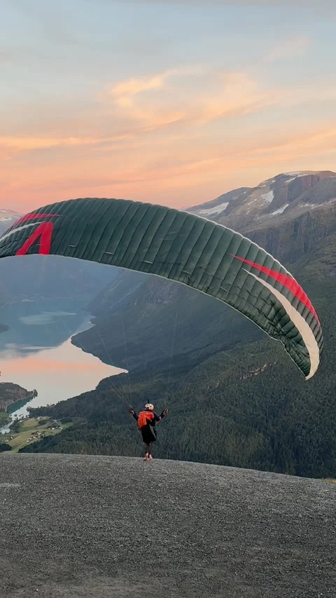 Paraglider Take Off and Launch from Mount Hoven Cliff, Norway Stock-Footage 346790862