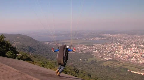 Paraglider take off flight Stock Footage 68681445