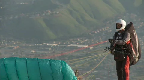 Paraglider takes off Stock Footage 657484