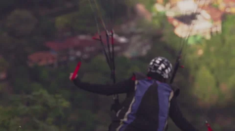 Paraglider takes off Stock Footage 64865402