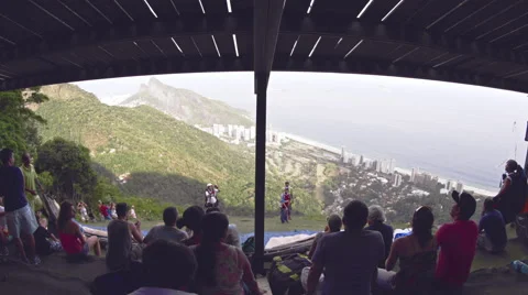 Paraglider takes off in front of spectators Stock Footage 64865326