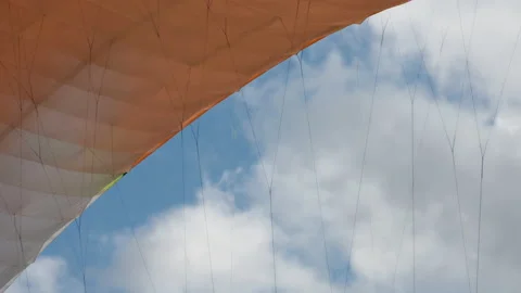 Paraglider wing against cloudscape Stock Footage 172534825