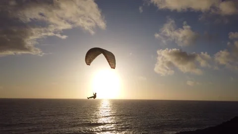 Paragliders on the Atlantic coast at sunset Stock Footage 310055497