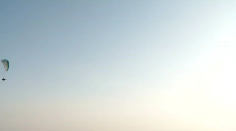 Paragliders cross screen Stock Footage 657520