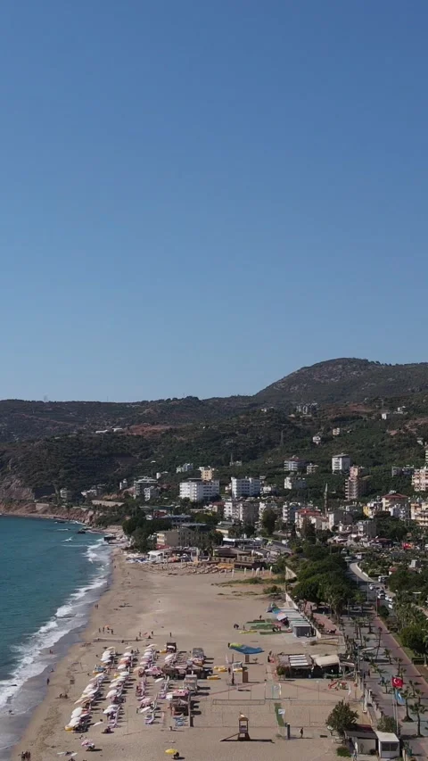 Paragliders Descending Towards The Beach Stock Footage 295335855