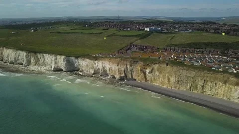 A Paragliders flying above cliffs Video stock 156339882