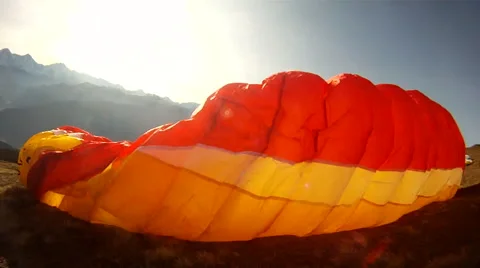 Paragliders preparing to paraglide. Stock Footage 68544522