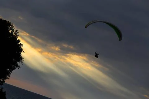  Paragliders at Sunset A paraglider soars in the sky at sunset Copyright: ... Stock Photos
