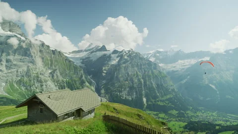 Paragliding above Grindelwald First, Switzerland 스톡 동영상 218994553