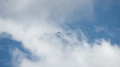 Paragliding against cloudscape Stock Footage 172533967
