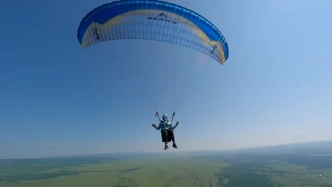 Paragliding at altitude Stock Footage 246574983