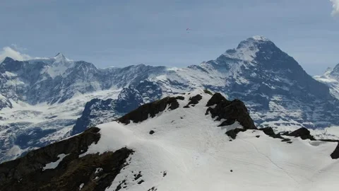 Paragliding and Eiger mountain in Switzerland (aerial view) Video stock 200815543