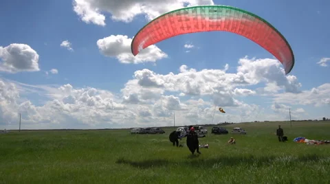 Paragliding. Athlete Getting Ready For Takeoff. the Expanded Wing of the Video stock 64742002