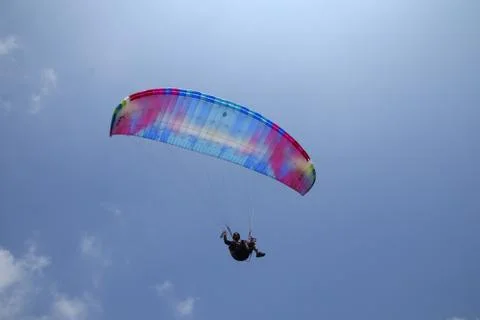 Paragliding athletes while competing Stock Photos