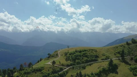 Paragliding on a background of clouds on a sunny summer day. Stock Footage 167500527