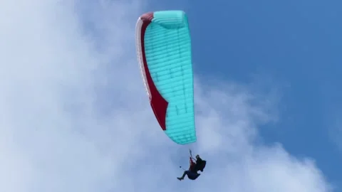 Paragliding in a cloudy sky over Chamonix Stock Footage 158821042