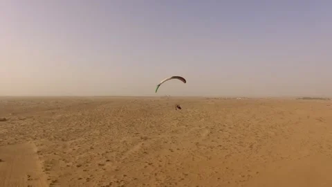 Paragliding in the desert Stock Footage 133005193