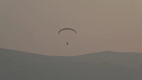 Paragliding in the field 11 Stock Footage 309555171