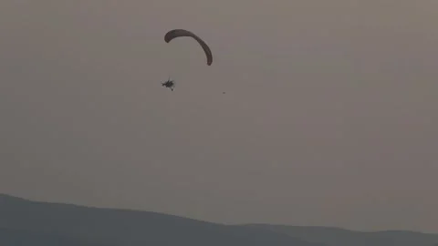 Paragliding in the field 12 Stock Footage 309555591