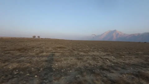 Paragliding in the field 3 스톡 동영상 309554453