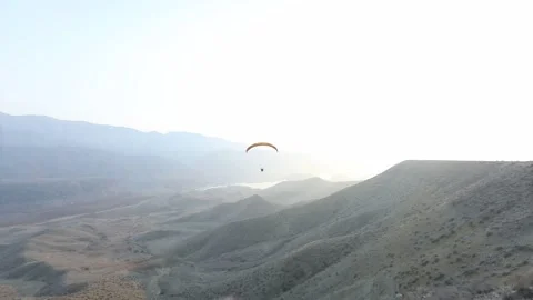 Paragliding in the field 7 Stock Footage 309554511