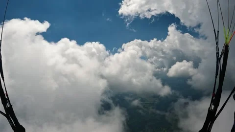 Paragliding Flight above the clouds heaven, flying freedom adrenaline adventure Stock Footage 278722531