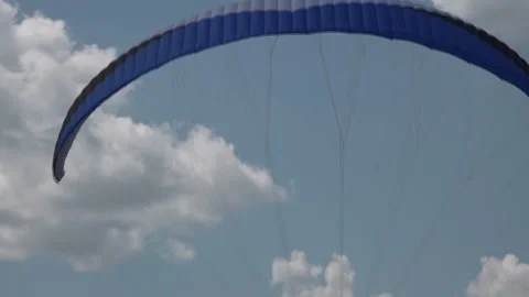 Paragliding flight in the sky among the clouds. Video stock 146640780