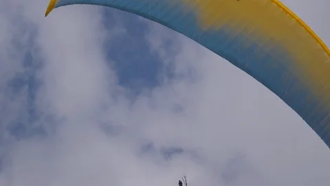 Paragliding Flying Close Up Cloudy Stock Footage 111411559