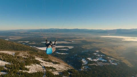 Paragliding Flying High Over Forest and Misty Valley at Sunrise, Peaceful Видео 320995312