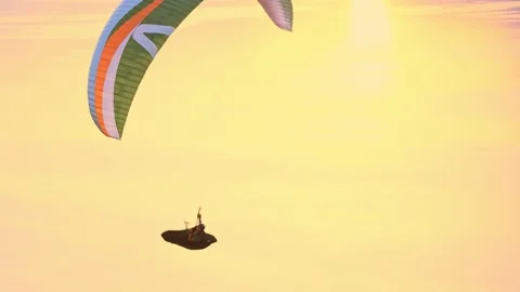 Paragliding Flying at Sunset Stock Footage 201610654