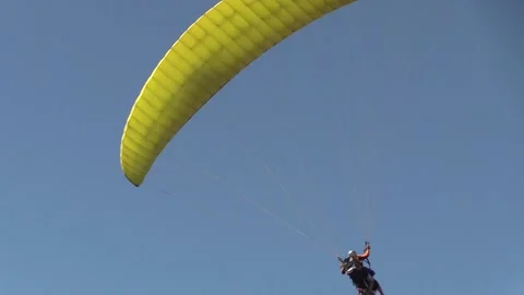 Paragliding with an instructor Stock Footage 145733394