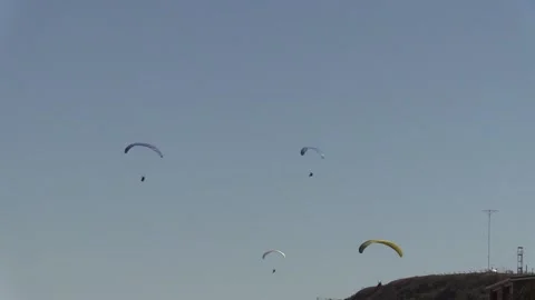 Paragliding with an instructor Stock Footage 145733396