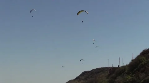 Paragliding with an instructor on the sea Stock Footage 145733397