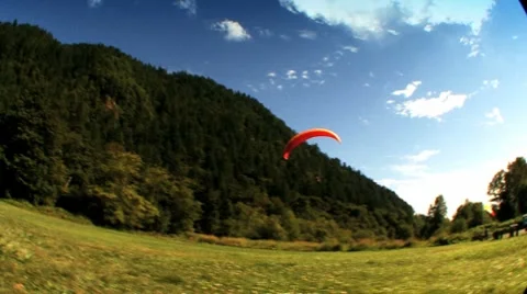 Paragliding landing Stock Footage 8560345