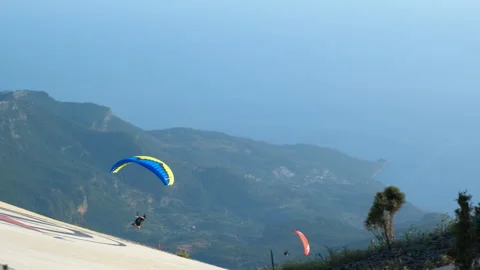 Paragliding launch in summer day. Video stock 246769769