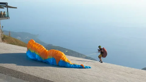 Paragliding mountain jump. Video stock 244347681