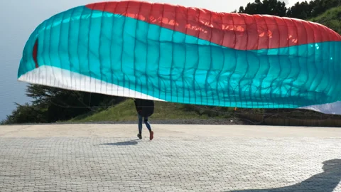 Paragliding mountain jump. Video stock 247026169