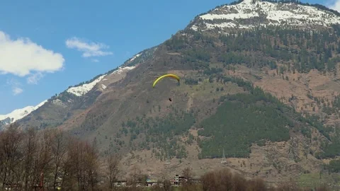 Paragliding with mountain view and bright sky at morning from different angle Stock-Footage 244697534