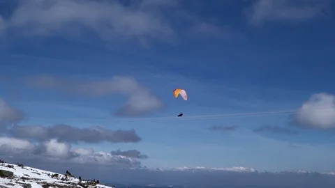 Paragliding in the mountains Stock Footage 107778919