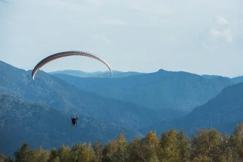 Paragliding in mountains 写真素材