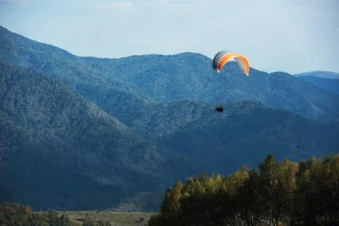 Paragliding in mountains 写真素材