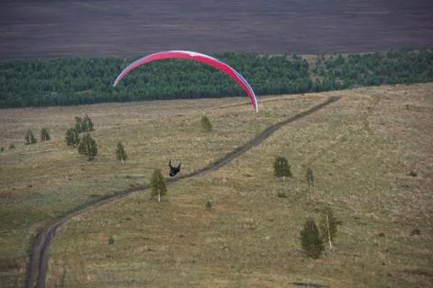 Paragliding in mountains Stock Photos