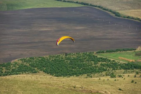 Paragliding in mountains 写真素材