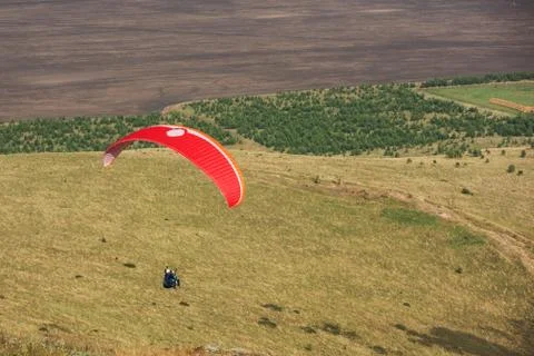 Paragliding in mountains 写真素材