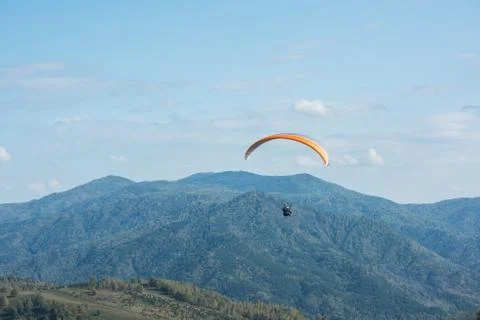 Paragliding in mountains 写真素材