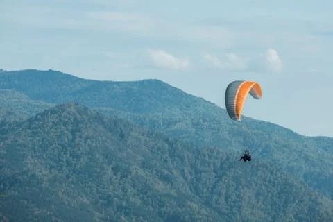 Paragliding in mountains 写真素材