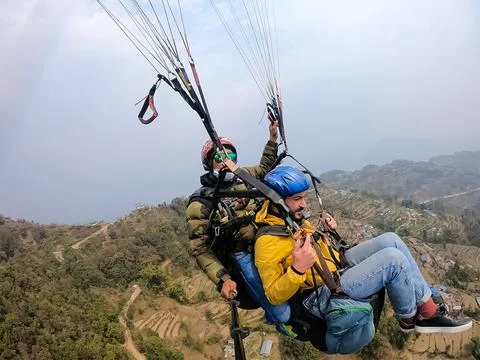 Paragliding in the mountains Stock Photos